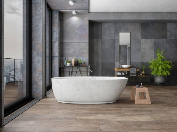 Bathroom tile dark flooring with bath tub | Kopp's Carpet & Decorating